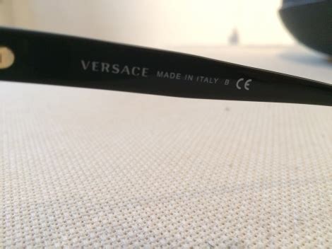 how to check authenticity of versace perfume|Versace sunglasses serial number lookup.